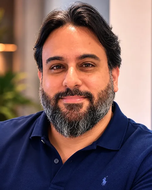 Emanuel Ribeiro, da SOMAI CAPITAL, de camisa polo azul